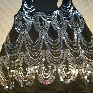Black sleeveless top with silver sequins.